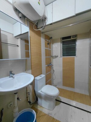 Bathroom in 2 BHK Apartment at Anmol Tower, Goregaon West – for Rent
