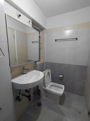 Attached Bathroom in 2 BHK Apartment at Anmol Tower, Goregaon West – for Rent