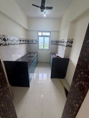 Team Area in 1 BHK Apartment at Vedant Sumeet Elite, Balkum Pada – for Rent