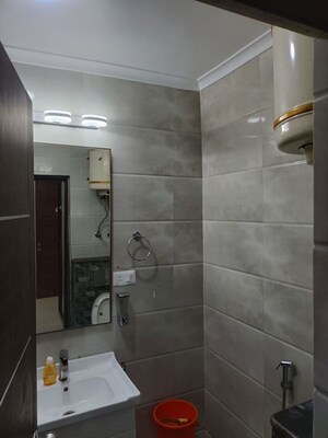 Bathroom in 4 BHK Apartment at Sector 6 Dwarka – for Rent
