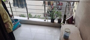 Balcony in 2 BHK Apartment at CGHS Shatabdi Enclave, Sector 49 – for Rent