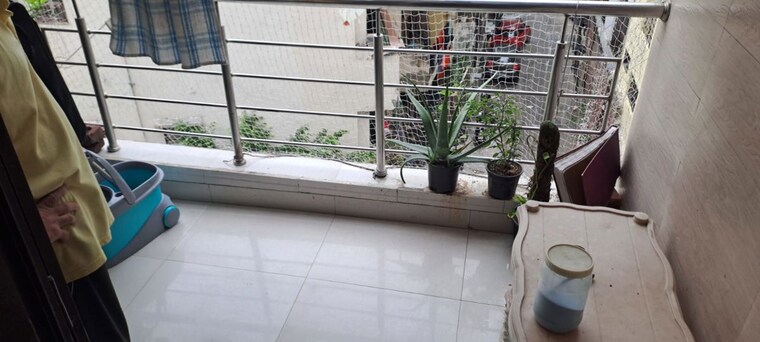 Balcony, cghs-shatabdi-enclave 2 Bedroom 1050 Sq.Ft. Apartment In Sector 49 Noida 10715342