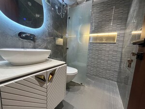 Bathroom in 4 BHK Apartment at Vasant Kunj – for Sale