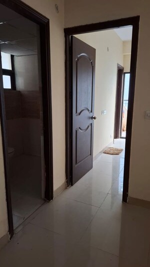 Building Lobby in 2 BHK Apartment at Charms Castle, Raj Nagar Extension – for Sale