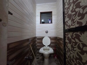 Bathroom in 2 BHK Apartment at Nagari Niwara CHS, Goregaon East – for Rent