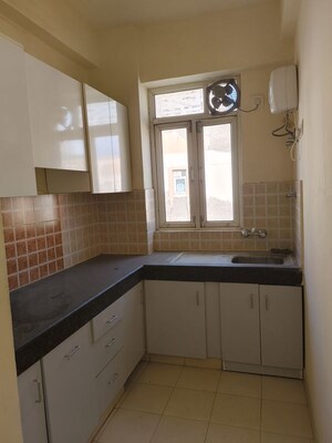 Kitchen in 2 BHK Apartment at Shree Vardhman Mantra, Sector 67 – for Rent