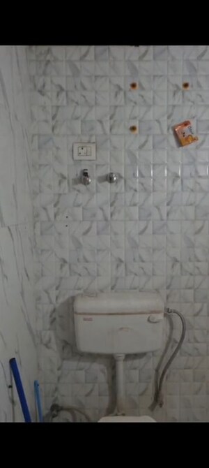 Bathroom in 2 BHK Apartment at Techman Moti Residency, Raj Nagar Extension – for Sale