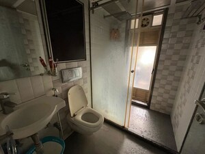 Bathroom in 2 BHK Apartment at Lokhandwala Galaxy, Byculla – for Sale