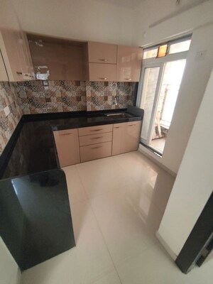 Kitchen in 1 BHK Apartment at Cosmos Enclave, Kasarvadavali – for Sale