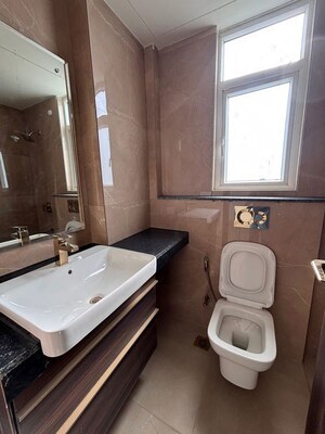 Bathroom in 3 BHK Apartment at Smart World Orchard, Sector 61 – for Rent