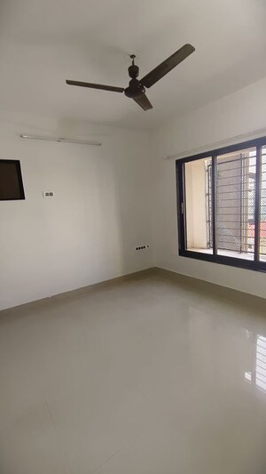 Room in 2 BHK Apartment at Swapnalok Towers, Malad East – for Rent