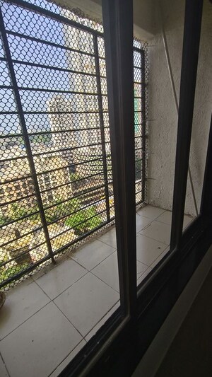 Balcony in 2 BHK Apartment at Swapnalok Towers, Malad East – for Rent