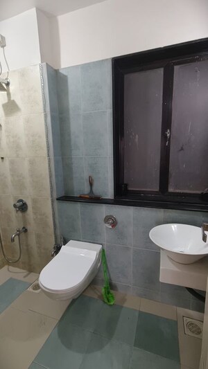 Bathroom in 2 BHK Apartment at Swapnalok Towers, Malad East – for Rent