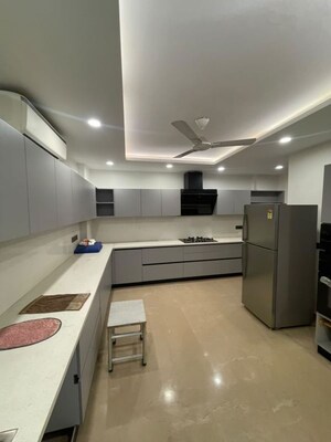 Kitchen in 4 BHK Builder Floor at Sushant Lok I – for Rent