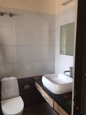Bathroom in 4 BHK Builder Floor at Sector 27 – for Rent