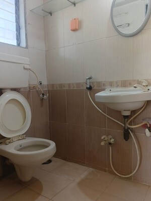 Bathroom in 2 BHK Apartment at Dheeraj Solitaire, Malad West – for Rent