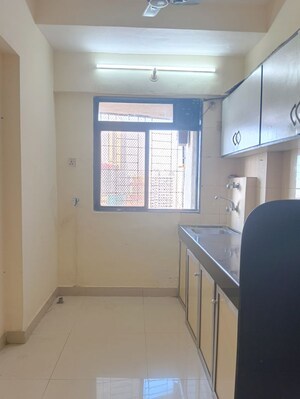 Kitchen in 2 BHK Apartment at Dheeraj Solitaire, Malad West – for Rent