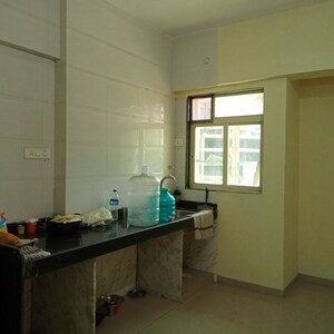 Kitchen in 2 BHK Apartment at Purshottam Nayan, Ghodbunder Road – for Rent