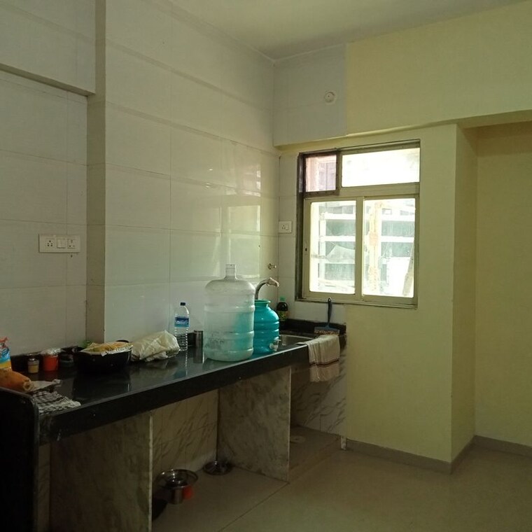 Kitchen, purshottam-nayan 2 Bedroom 650 Sq.Ft. Apartment In Ghodbunder Road Thane 10715997
