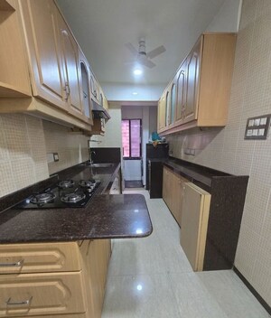 Kitchen in 2 BHK Apartment at Cosmopolitan Apsara Apartment, Pali Hill – for Rent