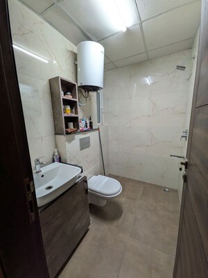 Bathroom in 2.5 BHK Builder Floor at Smart World Gems, Sector 89 – for Rent