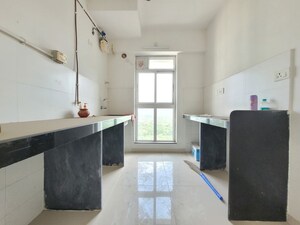 Kitchen in 1 BHK Apartment at Puranik Hometown, Ghodbunder Road – for Rent