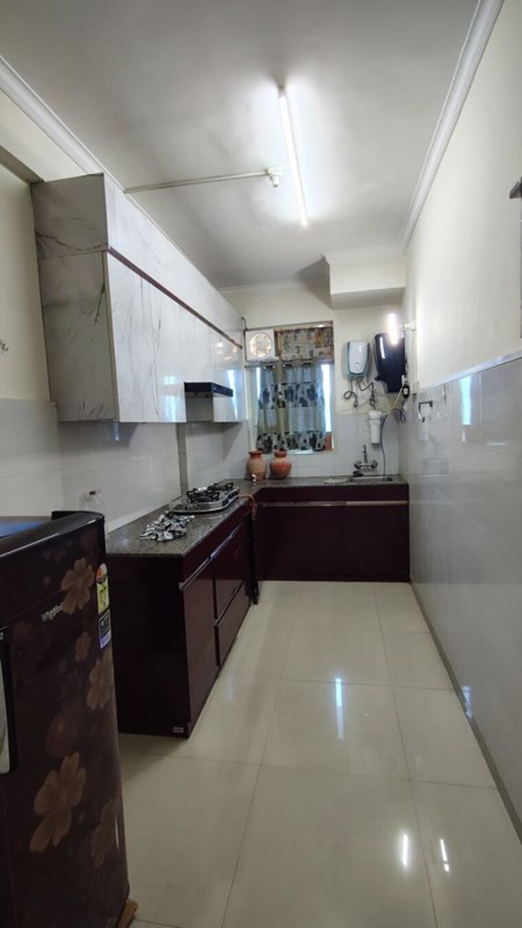 Kitchen, pyramid-midtown 2 Bedroom 678 Sq.Ft. Apartment In Sector 59 Gurgaon 10716137