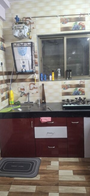 Kitchen in 1 BHK Apartment at Megh Malhar Co-op Housing Society, Ghansoli – for Rent