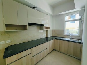 Kitchen in 2 BHK Apartment at Smart World Orchard, Sector 61 – for Rent