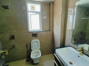 Bathroom in 2 BHK Apartment at Smart World Orchard, Sector 61 – for Rent