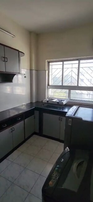 Kitchen in 1 BHK Apartment at Sunshine  Court, Kalyani Nagar – for Rent