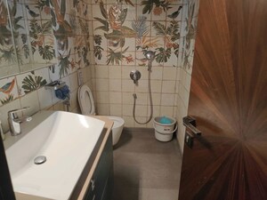 Bathroom in 3 BHK Apartment at Parmanand Wadi – for Sale