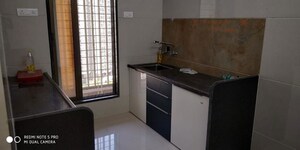 Kitchen in 1 BHK Apartment at Unique Greens Ghodbunder Road, Ghodbunder Road – for Sale
