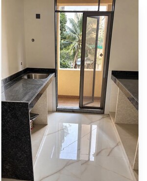 Kitchen in 1 BHK Apartment at Ram Pushpanjali Residency, Owale – for Rent
