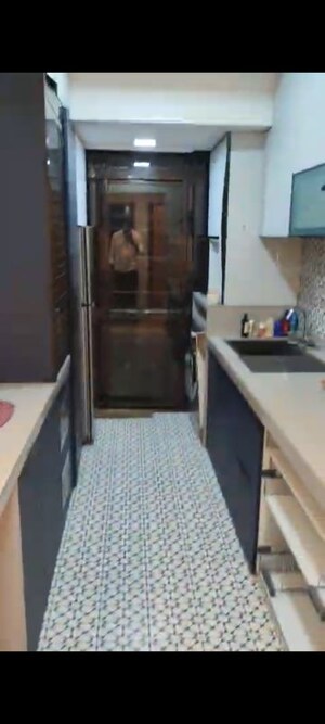 Kitchen in 2 BHK Apartment at Datta Parag Apartment, Andheri West – for Rent