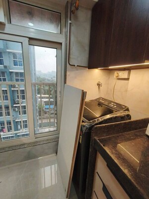 Kitchen in 2 BHK Apartment at Andheri CHS, Andheri West – for Rent