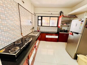 Kitchen in 2 BHK Apartment at Shriram Nagar CHS, Aundh – for Rent