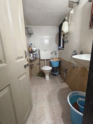 Bathroom in 2 BHK Apartment at Tilak Safalya, Tilak Nagar – for Rent