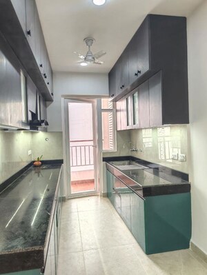 Kitchen in 3 BHK Apartment at Rishita Mulberry Heights, Sushant Golf City – for Rent