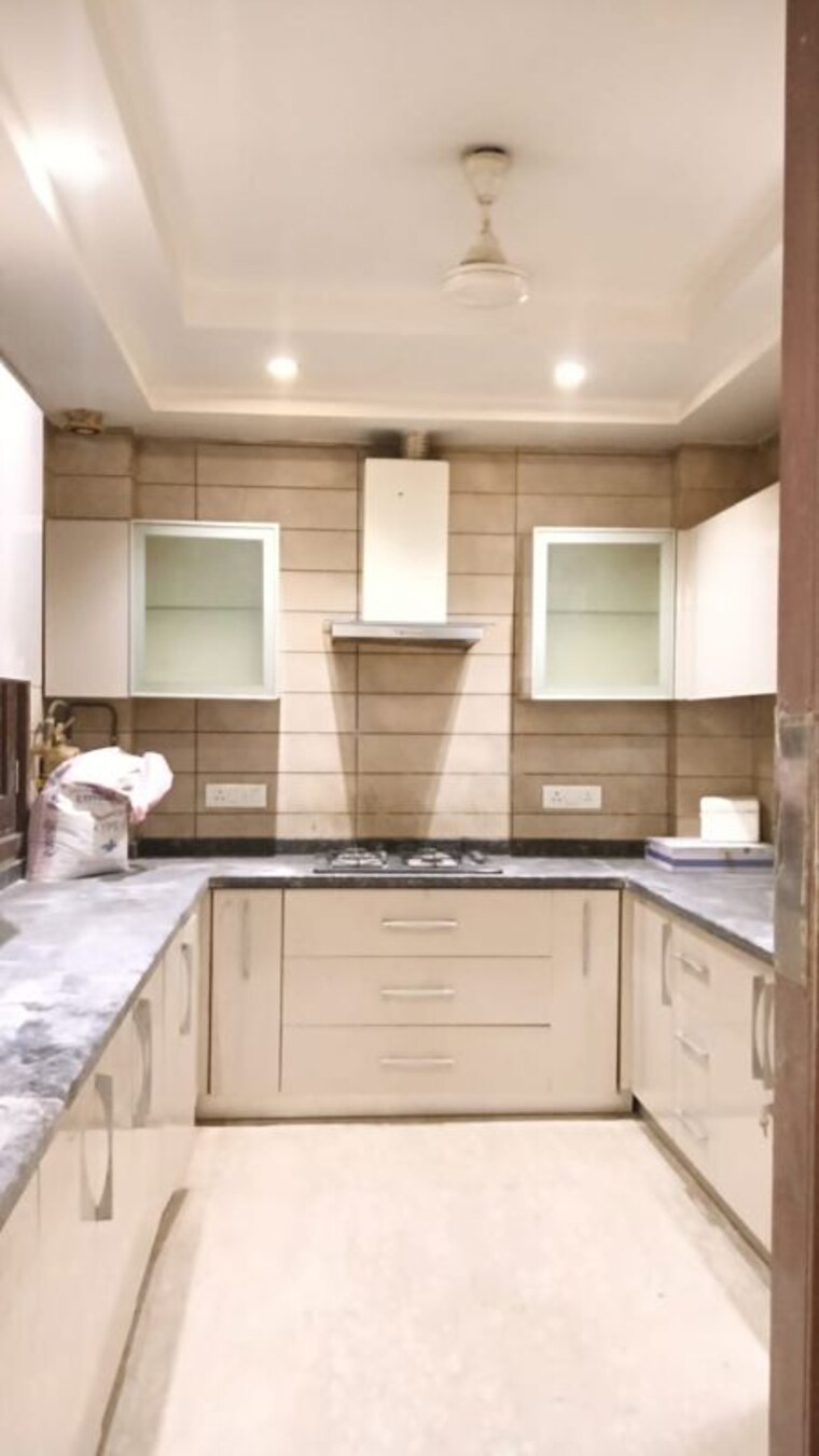 Kitchen, defence colony 3 Bedroom 217 Sq.Yd. Builder Floor In Defence Colony Delhi 10699610