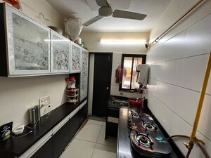 Kitchen in 2 BHK Apartment at Uttam Enclave, Aundh – for Rent