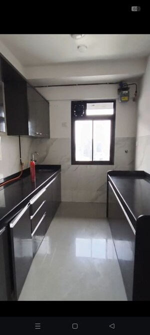 Kitchen in 2 BHK Apartment at Dev Leo Tower, Oshiwara – for Rent