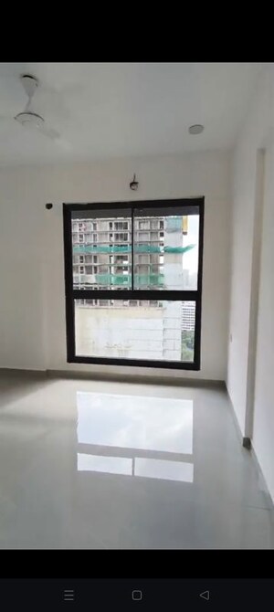 Room in 2 BHK Apartment at Dev Leo Tower, Oshiwara – for Rent