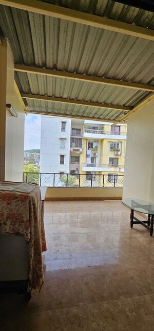 Living Room in 2 BHK Apartment at Sarala Roses, Baner – for Rent