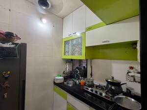 Kitchen in 1 BHK Apartment at Amrut Dham Apartment, Gothivali Village – for Sale
