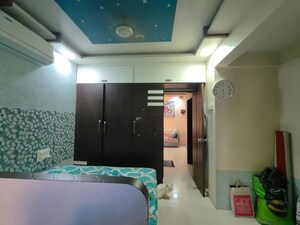 Bedroom in 1 BHK Apartment at Amrut Dham Apartment, Gothivali Village – for Sale