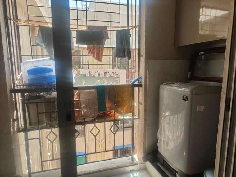 Kitchen, nyati-era 2 Bedroom 835 Sq.Ft. Apartment In Dhanori Pune 10717039