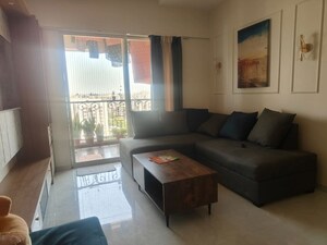 Living Room in 2 BHK Apartment at Nyati Era, Dhanori – for Rent