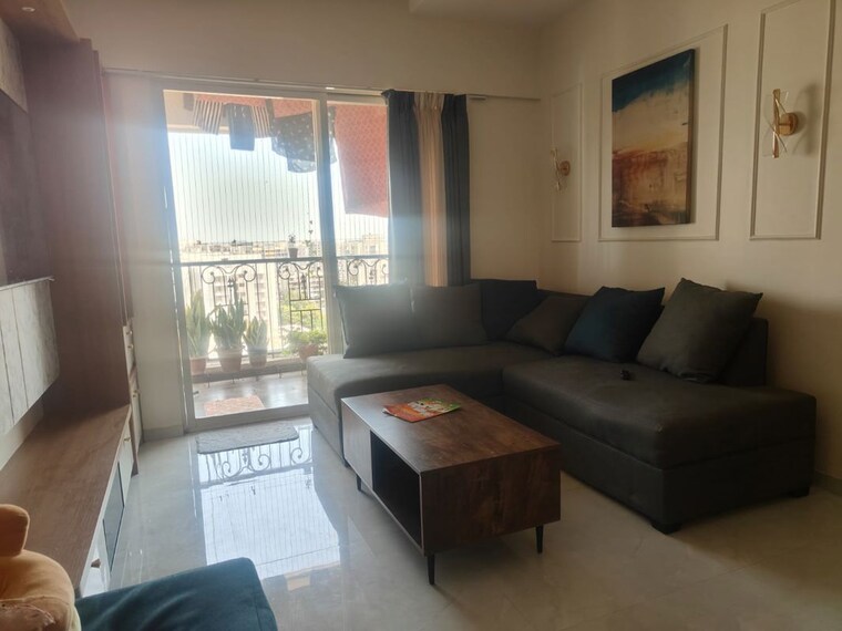 Living Room, nyati-era 2 Bedroom 835 Sq.Ft. Apartment In Dhanori Pune 10717039