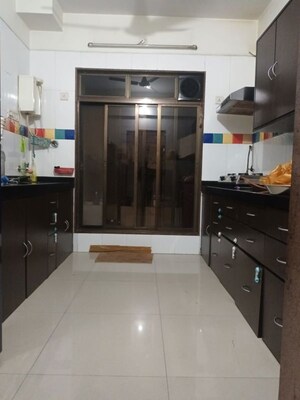 Kitchen in 2 BHK Apartment at Trishul Gold Coast, Ghansoli – for Rent